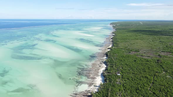 Aerial View of the Indian Ocean Near the Shore of the Island of Zanzibar Tanzania Slow Motion