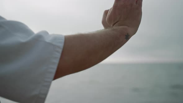 Unknown Sportsman Hands Practicing Karate Position