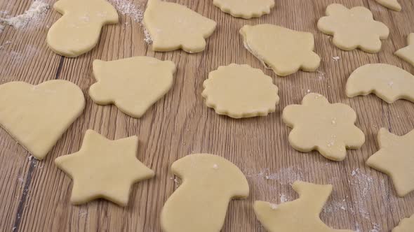 The process of making cookies from shortbread dough.