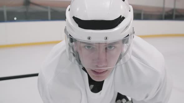 Portrait Of Hockey Player In Face Shield