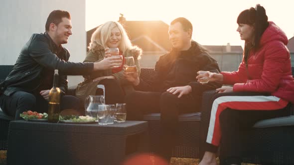 Happy Friends Having Fun Outdoor. Young People Enjoying. Youth Friendship Concept. Hands Toasting a