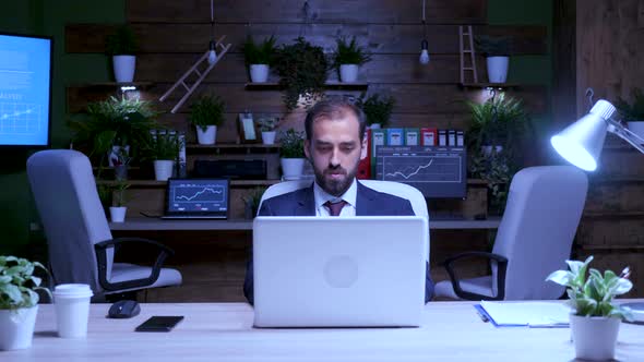 Zoom in Shot of Businessman Working on the Computer