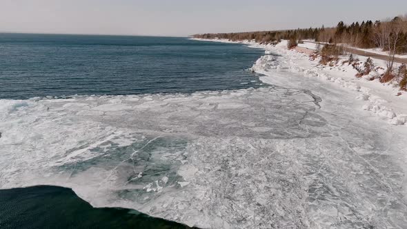 Flyover View Of Duluth Ice Sheets In Lake Superior, Minnesota.  Aerial