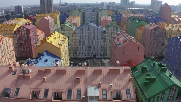 Top view of the colorful modern buildings, aerial footage from the drone 