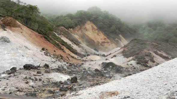 Calming Scenery of Fog moving through Mountains, Jigokudani, Hell Valley, Still Shot, Wide Shot