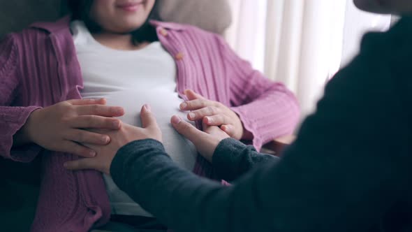 Pregnant Couple Feels Love and Relax at Home