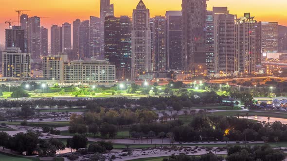 Jumeirah Lake Towers Skyscrapers and Golf Course Day to Night Timelapse Dubai United Arab Emirates