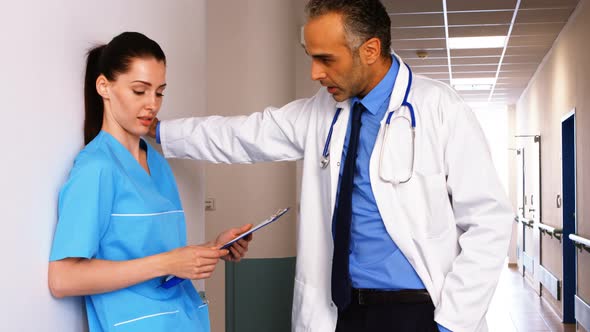 Doctor interacting with nurse