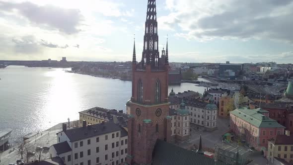 Aerial Parallax around Old Church. Aerial shot of Riddarholmen Church, Stockholm, Sweden