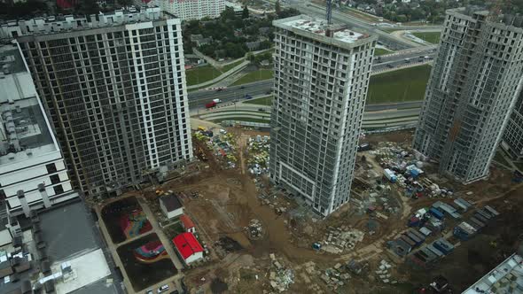 Construction of modern multi-storey buildings. Construction of a new city block.