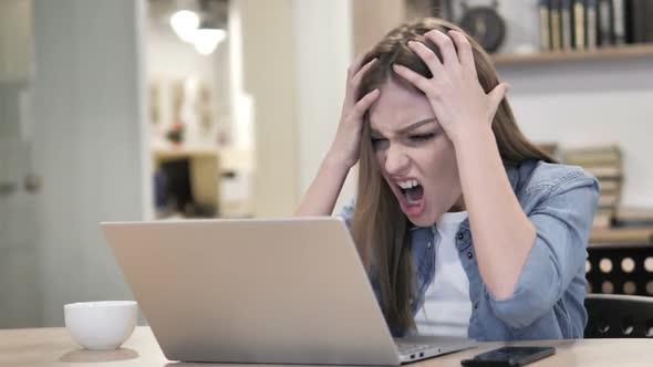 Angry Creative Woman Yelling While Working in Office