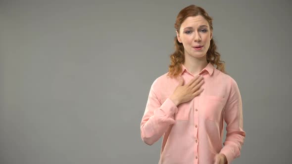 Deaf Female Asking Again Please in Sign Language, Teacher Showing Words in Asl