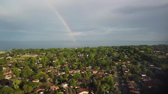 Rainbow over city after rain