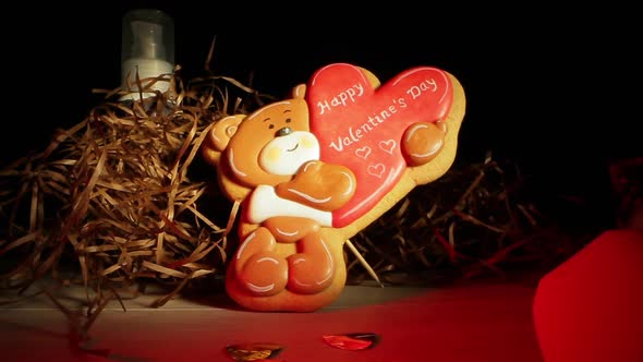 Cute Gingerbread and Sex Toys Near Artificial Hay on Table