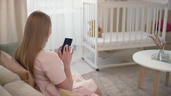 Pregnant Woman Looking At Baby Ultrasound