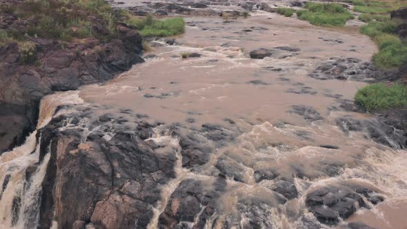 Waterfall in river in Laikipia, Kenya. Aerial drone reveal