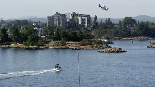 Panning view of boats and sea plane