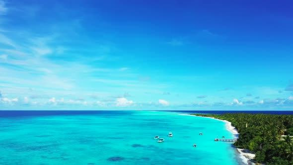 Aerial sky of marine tourist beach holiday by clear ocean and white sand background of a dayout in s