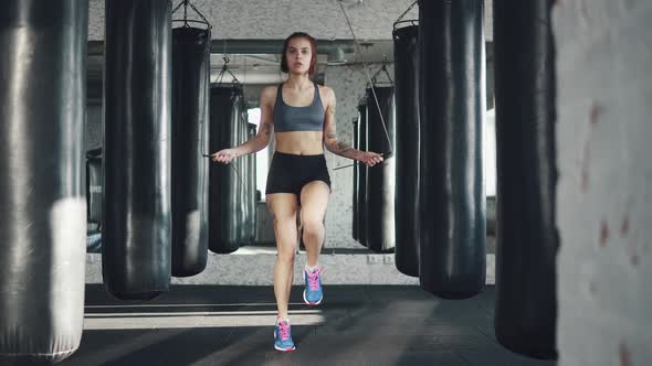 Portrait of a Female Athlete in the Gym