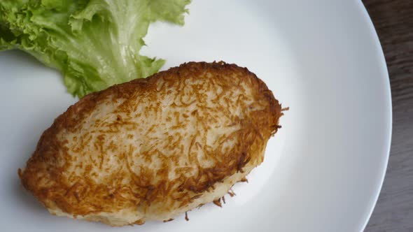 vegetarian, vegetable cutlet in a plate close-up rotation. Ready serving dish on a rotating plate