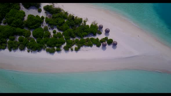 Aerial flying over nature of tropical resort beach holiday by transparent sea and white sandy backgr