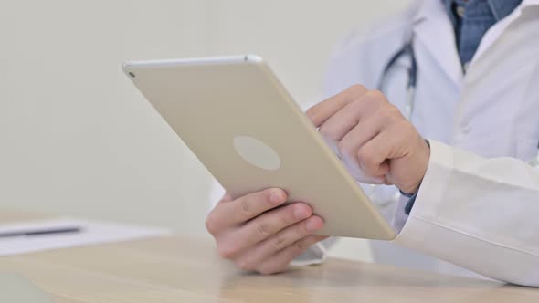 Close Up of Doctor Using Digital Tablet 