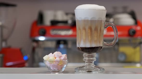 Drink and Marshmallows Stand on the Bar of a Restaurant