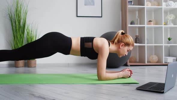 Fitness at Home Pilates Online Woman Holding Plank