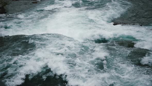 Natural Streams of Water and Foam Rushing Down at Niagara