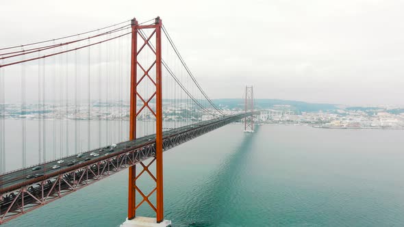 Breathtaking Ponte De Abril Lisbon Bridge with Distant Cars