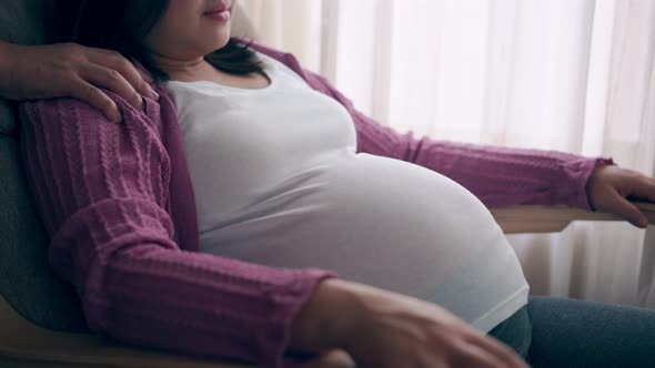 Pregnant Couple Feels Love and Relax at Home