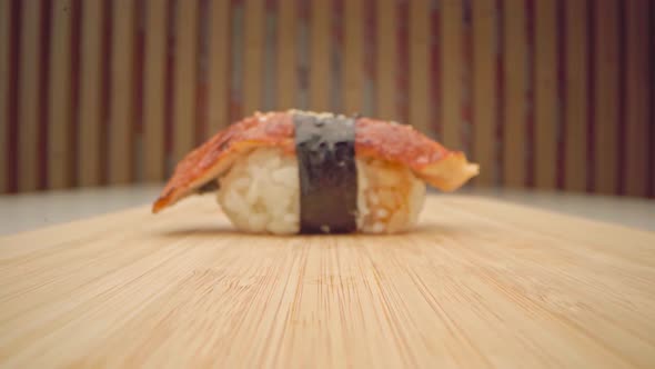 Zoom in Video of Nigiri Sushi Piece Fish on Rice Close Up