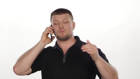 Angry Man Talking on Phone. White