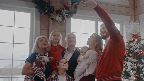 Family Talks Through Video Chat on Christmas Eve All Dressed Up