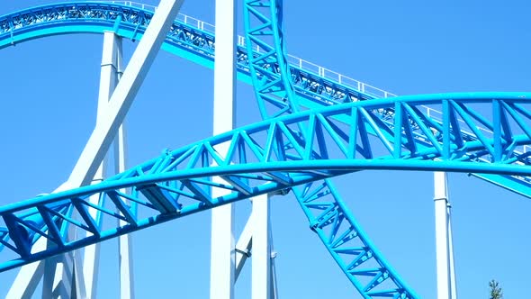 Rollercoaster Upside Down Close-up in an Amusement Park, Slow Motion