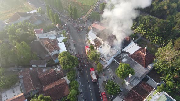 Aerial view of house fires in densely populated settlements in Indonesia