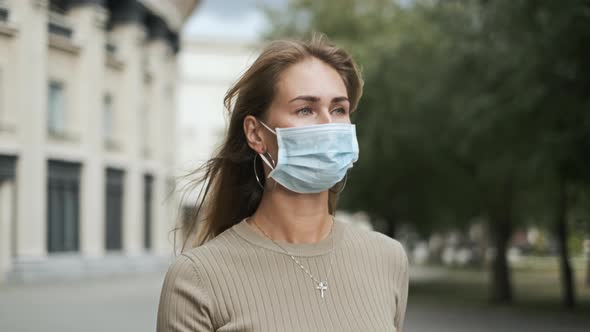 Girl in Masks Walking Empty Italy Street Coronavirus. Lady Near Theater Covid-19