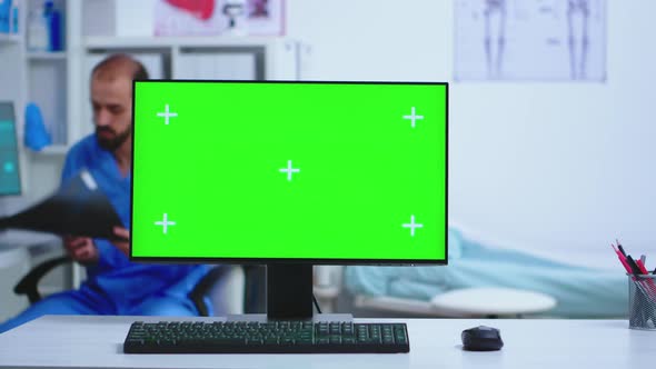 Computer Desktop with Green Screen in Hospital