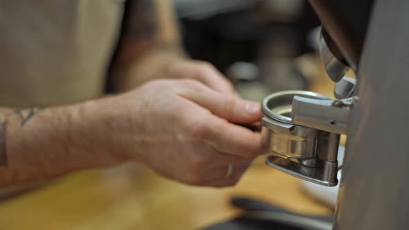 Barista Making Coffee in Coffeeshop