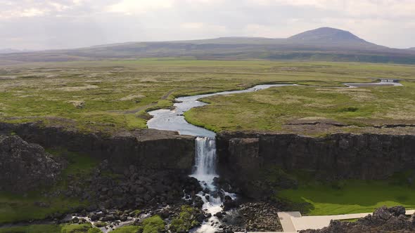 Flying Over the Oxarafoss Waterfall in Iceland