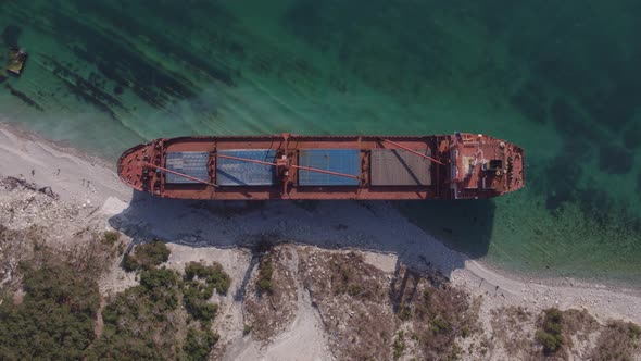 The Ship Ran Aground. Environmental Pollution at Sea. Aerial View. Grounded Ship. Drone Footage