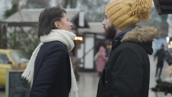 Portrait of Nervous Caucasian Woman Yelling and Gesturing Emotionally. Young Girl Arguing with Her