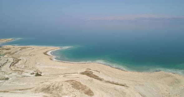 Aerial view of colourful sinkholes. The Dead sea, Negev, Israel.