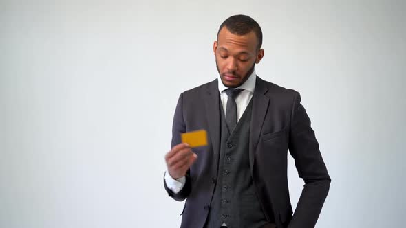 African-american Businessman Holding Credit or Debit Bank Card