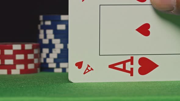 Two Aces Thrown on Green Casino Table