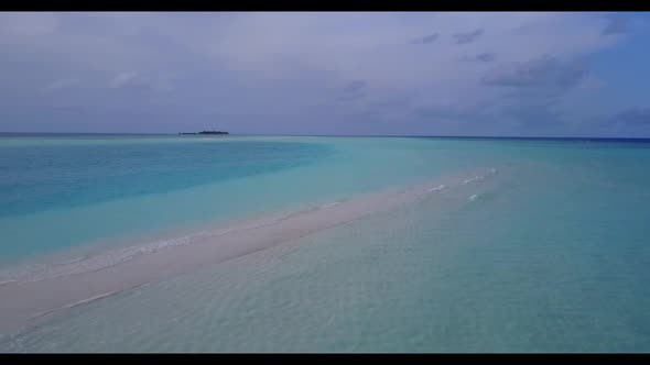 Aerial top view texture of exotic tourist beach trip by aqua blue lagoon and white sandy background 