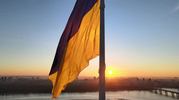 Ukrainian Flag in the Morning at Dawn. Aerial. Kyiv. Ukraine