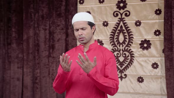 Muslim man reading Namaz