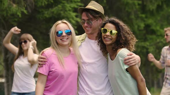 Cheerful Friends Dancing in Sunglasses, Having Fun Together, Enjoying Summer