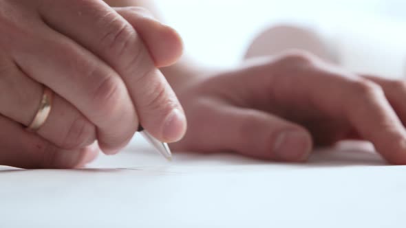 Close-up of an architect's hands. Professional real estate designer